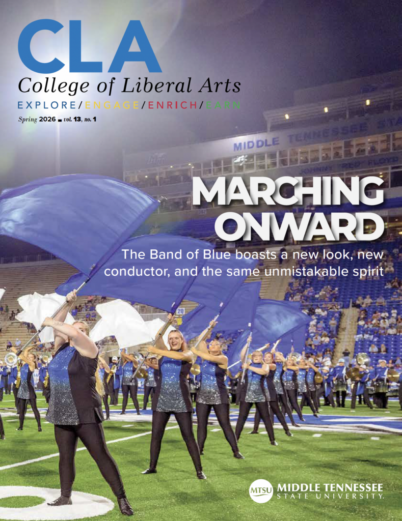 CLA Magazine Cover with band of blue image of band of blue performing. 