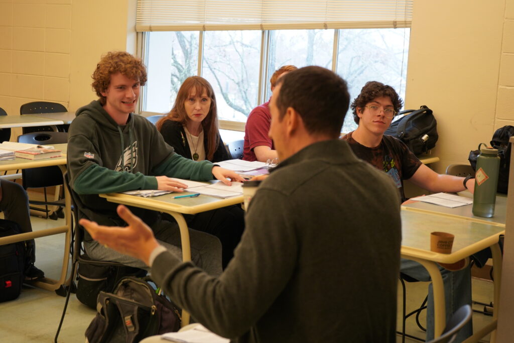 professor speaking with students